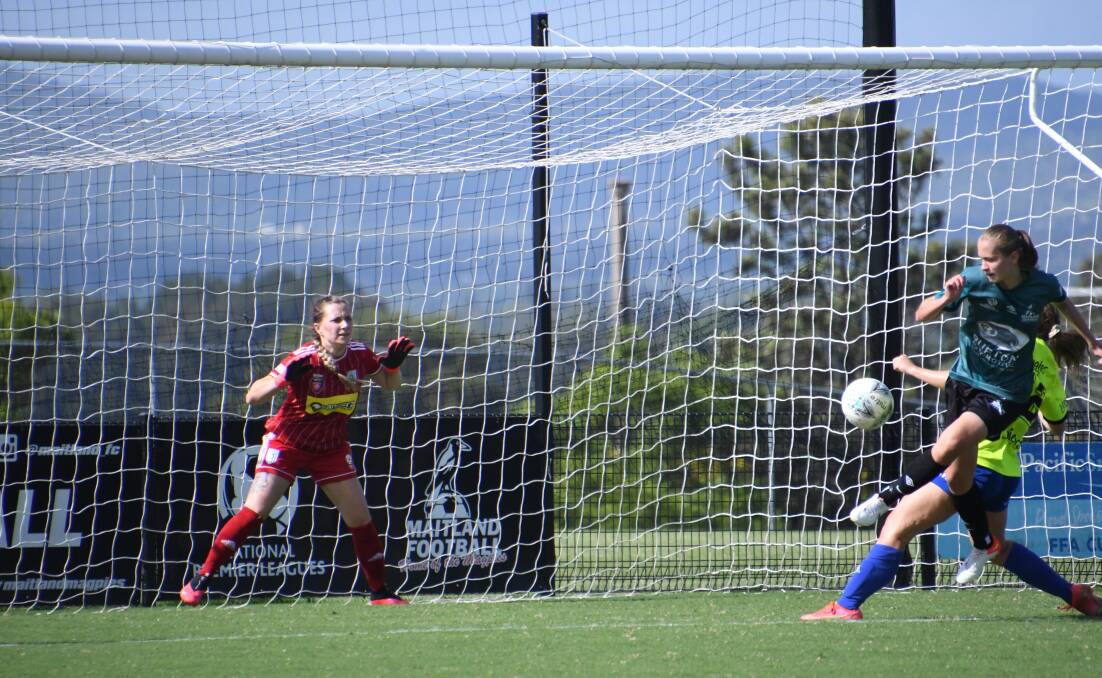 WELCOME TO THE NEST: Maitland Magpies recruit Chelsea Greguric beat the Newcastle Olympic keeper to open the scoring in her first home game at Cooks Square Park. Picture: Michael Hartshorn