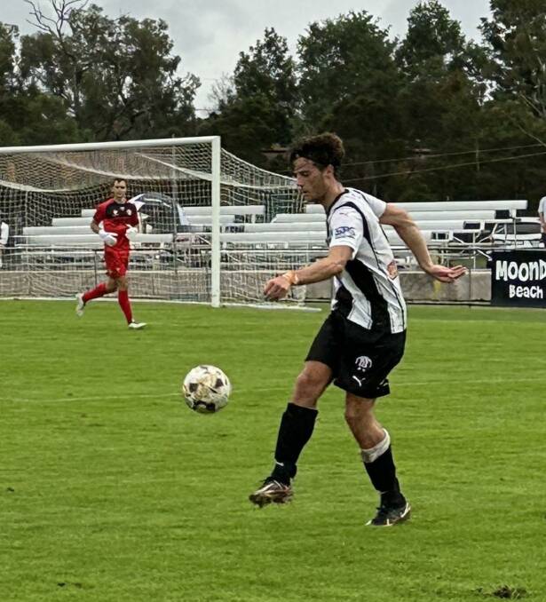 Weston Bears player Alessandro Ouwerkerk sends the ball forward against Newcastle Olympic on Saturday night. Picture supplied.