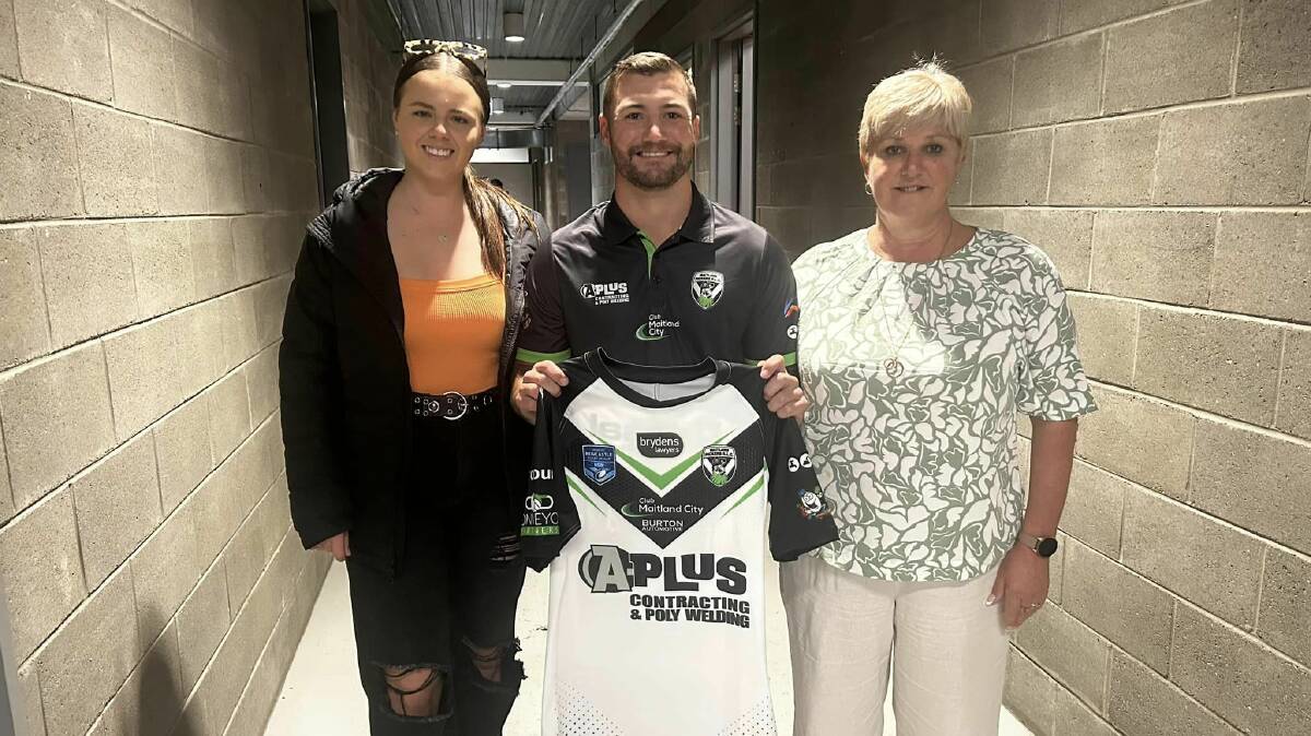 Jayden Wright with his family after being presented with his jersey before his first, first grade game for Maitland. Picture supplied.