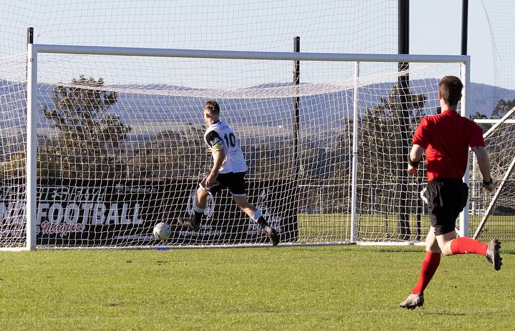 Jimmy Thompson slots home one the three goals in his hat-trick against Cooks Hill on Saturday. Picture: Graham Sports and Nature Photography