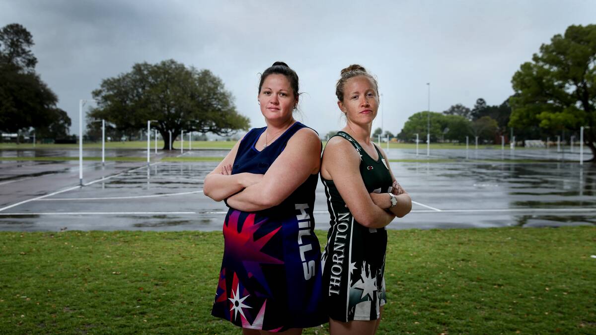 BEST OF RIVALS: Hills Solicitors Mel Morris and The George Tavern's Laura Nolan will line up on each other in Saturday's A-grade netball grand final. Picture: Marina Neil
