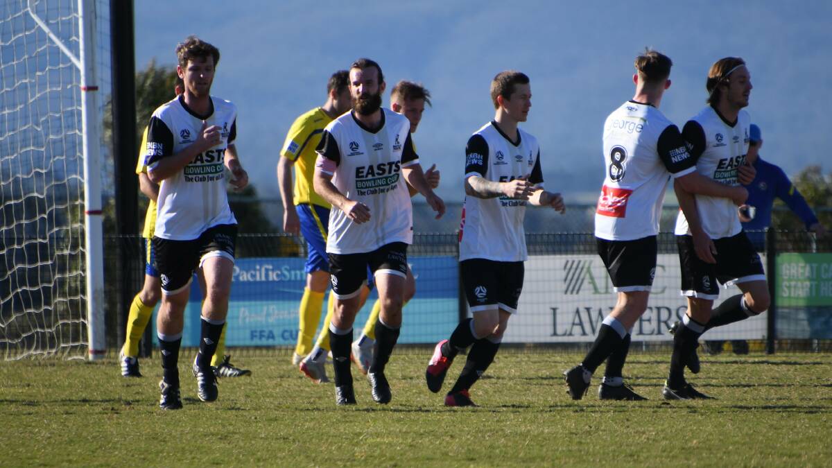 ON TARGET: Maitland FC players celebrate after Joel Wood scored against Lake Macquarie.