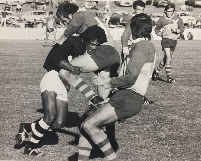 TAKE THAT: Merv Wright tackles Lakes winger Jim Porter - he gave the Lakes winger a torrid time in the 1969 Newcastle Rugby League grand final. 