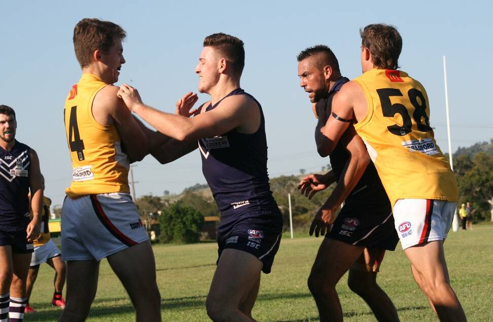 Maitland Saints Riley Newstead (left) and Dustin Spriggs stand their ground against Lake Macquarie. Picture: Sally Rainbow
