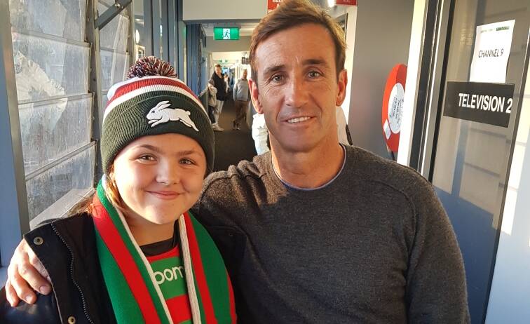 STAR: Rabbitohs fan Ruby with form Knights legend Andrew Johns.