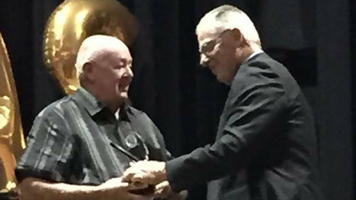 DEDICATED: Cessnock Mayor Bob Pynsent (right) congratulates Gary Jack on his 50 years of service to the Cessnock Goannas.