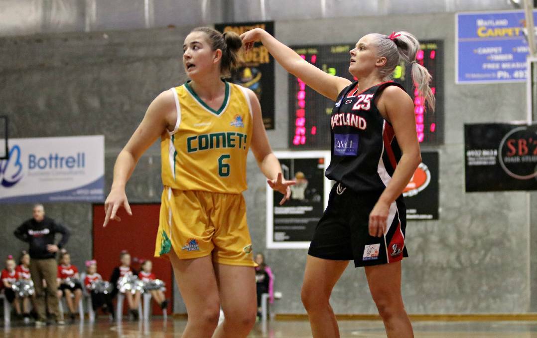 Shakera Reilly (right) in action for the Maitland Mustangs this season. Picture Jacqui Neill