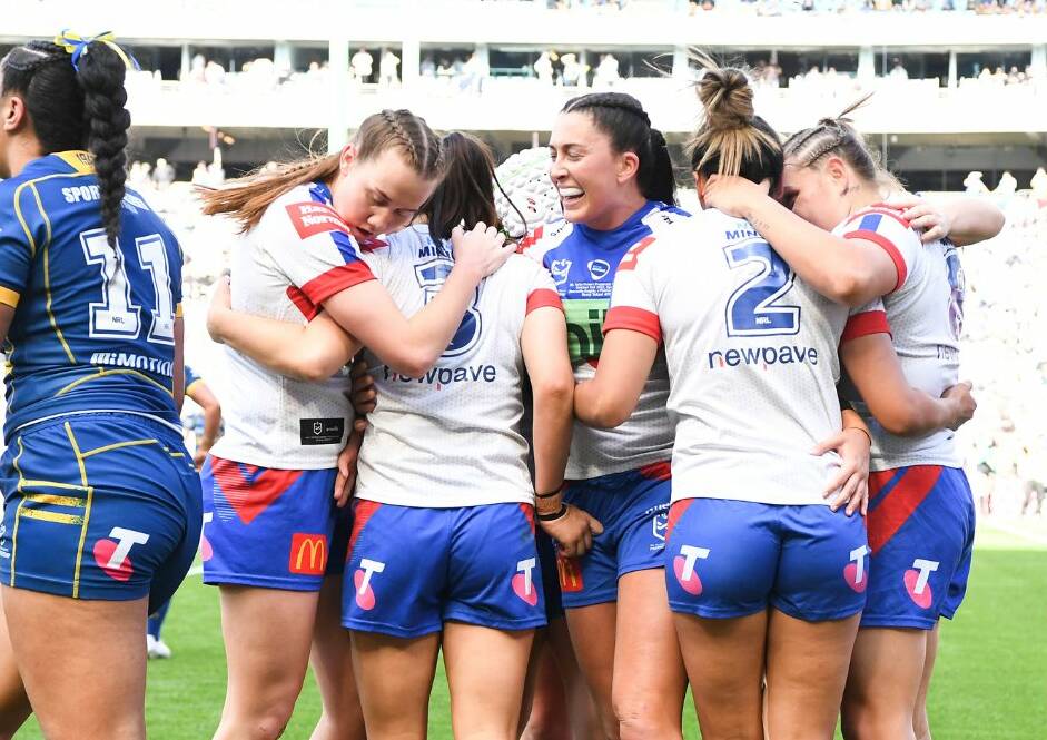 Newcastle Knights players celebrate their historic NRLW grand final win. Picture by NRL media.
