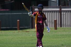 Braxton Smith, pictured acknowledging scoring a 50 earlier this season, made 109 not out for Maitland Maroon Under-13s. Picture by Michael Hartshorn
