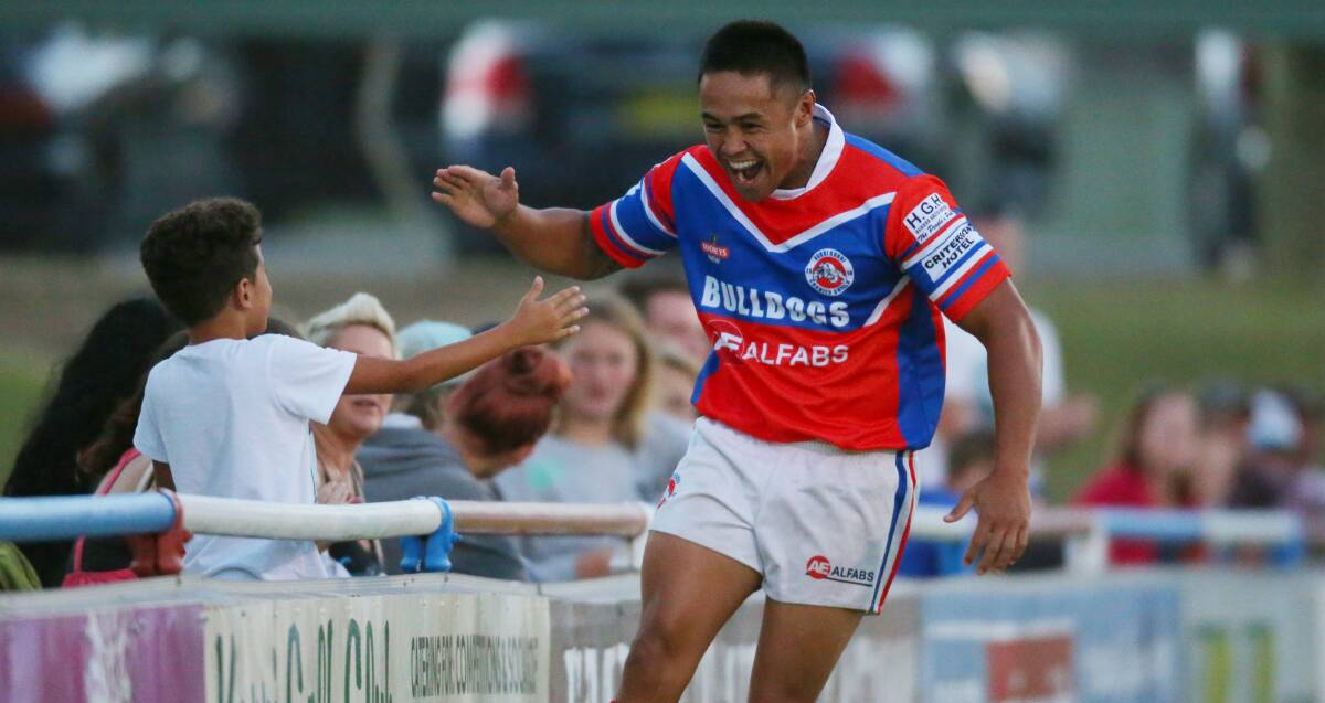 ELATED: Terence Seu Seu celebrates his try with part of the big crowd at Kurri Kurri Sportsground for the Charity Shield against Cessnock. Picture:  MAX MASON-HUBERS