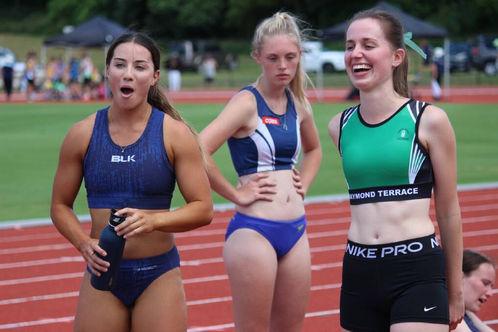 Maitland's Brittany Carroll (left) and Raymond Terrace's Lily Cains (right) after competing in the long jump. Picture: Athletics NSW