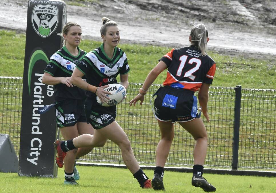 POINTS MACHINE: Maitland and the competition's leading try and point scorer Estelle Hughes takes the ball up against Kotara last Saturday. Picture: Amanda Hafey