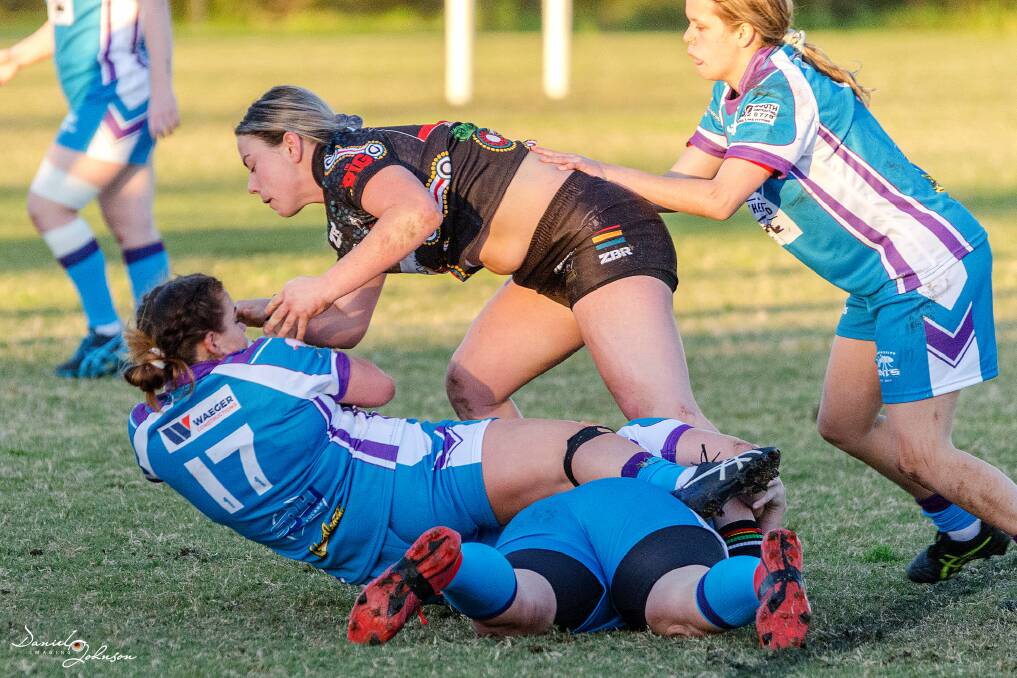 The Aberglasslyn Ants jumped to the top of the A-grade women's tackle competition with a 18-4 win against Berkley Vale. Picture: Daniel Johnson
