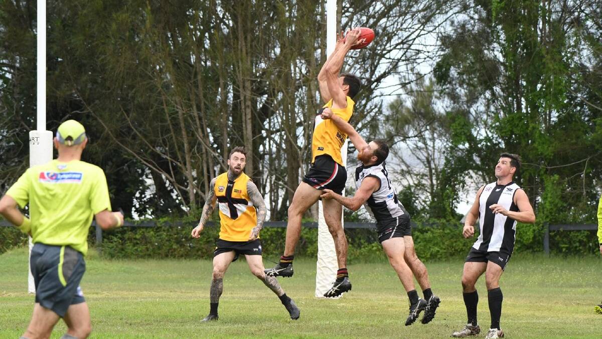 Maitland Saints star Pat McMahon takes a mark against Wyong with fellow Hunter rep Aiden Damico waiting for the crumbs. Picture: Grant Power