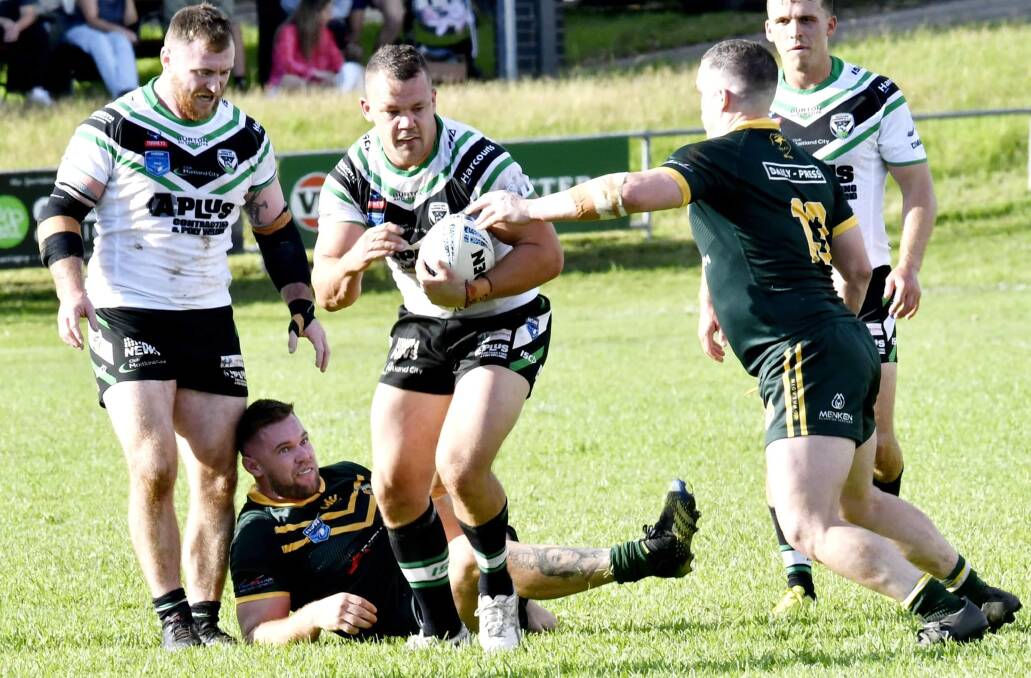 Pickers forwards James Taylor, Sam Anderson and Alex Langbridge in action against Wyong. Picture: Amanda Hafey