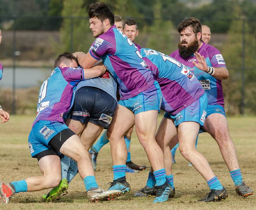DEFENSIVE EFFORT: The Aberglasslyn Ants meet Tall Timbers in the C-grade All Age grand final on Saturday. Picture: Daniel Johnson