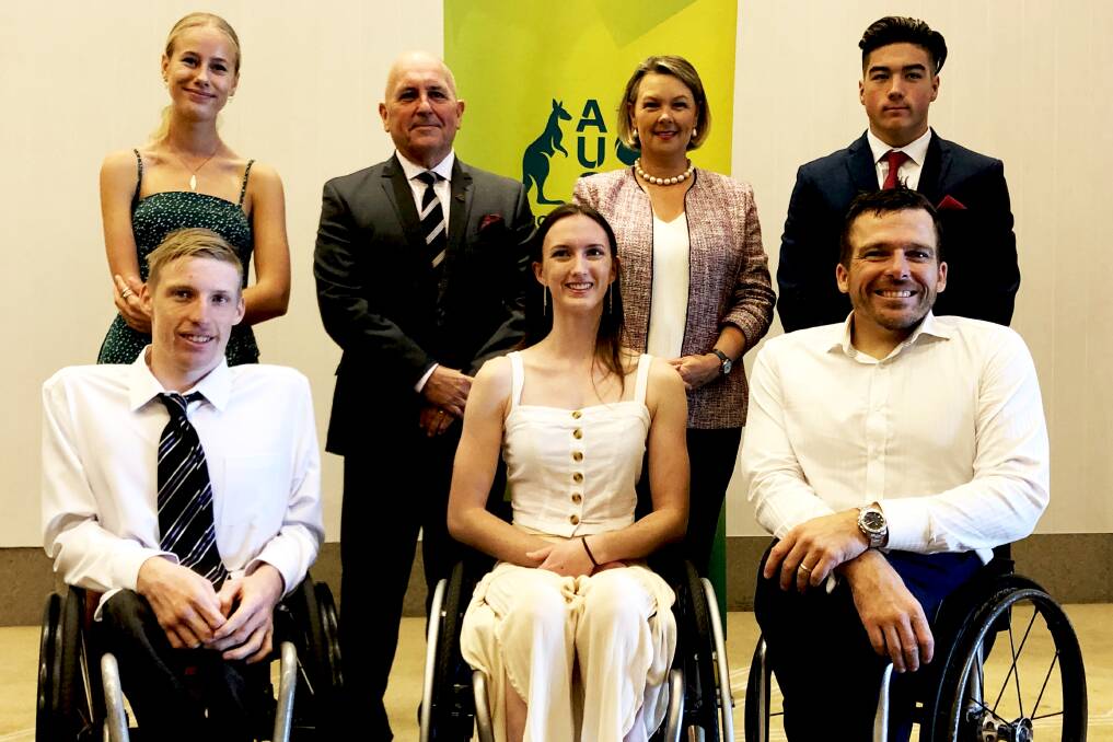 GAMES PROSPECT: Aimee Fisher (bottom centre) with Kurt Fearnley (bottom right) at the presentation of Kurt Fearnley scholarships last year.