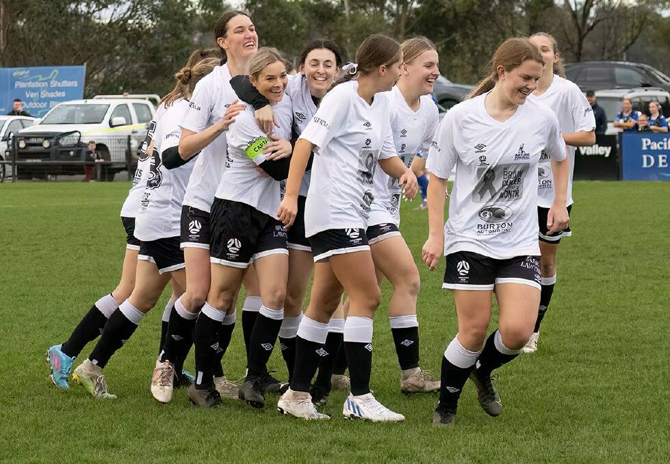Maitland players congratulate skipper Sophie Stapleford on the opening goal of the match. Picture: Graham Sports Photography