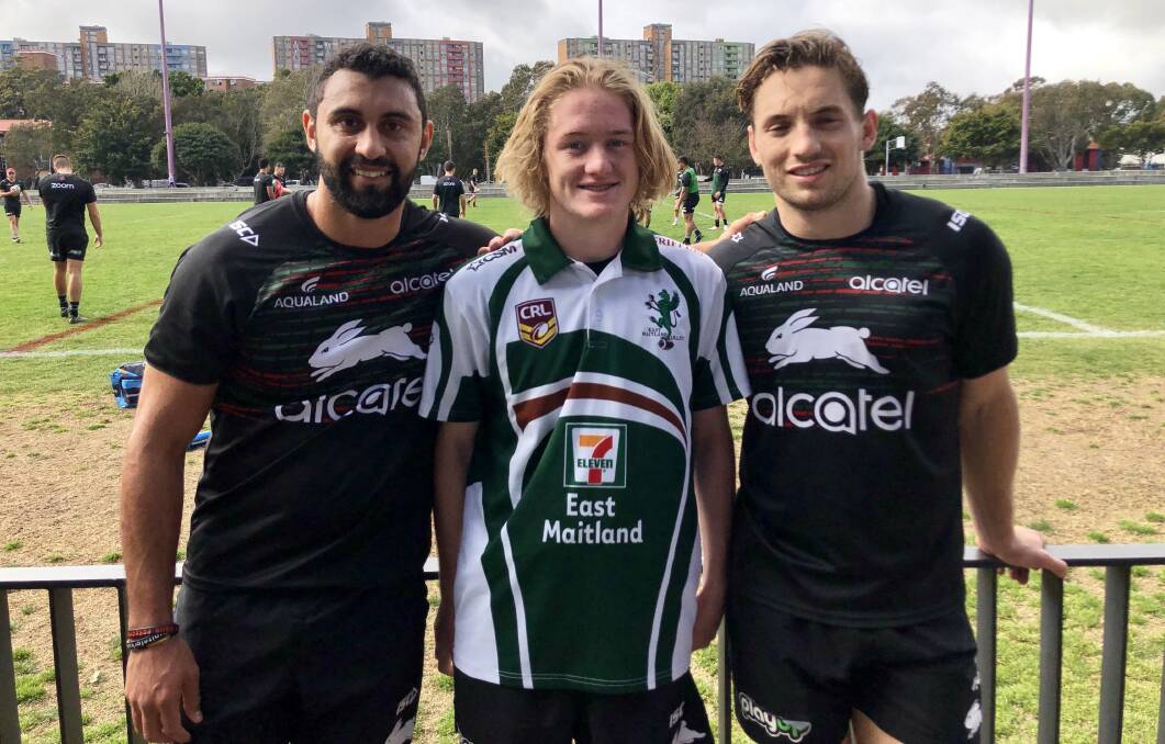 Young achievers: Hayden Hackney with Rabbitohs stars Alex Johnson (left) and Cameron Murray at Redfern.