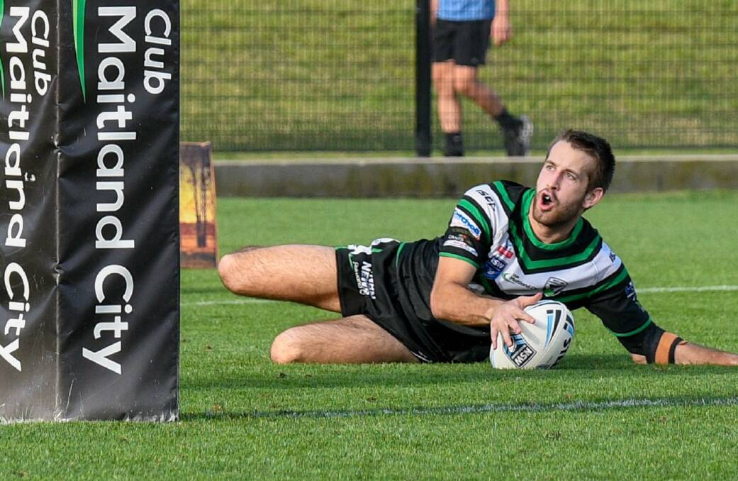 Maitland wing James Bradley scores the winning try under the uprights. The Pickers defeated Hills Bulls 16-14 in a thrilling semi-final at Maitland Sportsground on Saturday. Picture: Smart Artist
