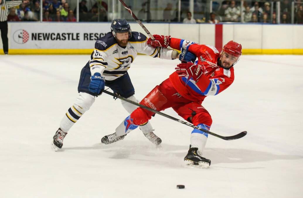 ACTION-PACKED: Canberra's Per Daniel Goransson and Newcastle's Nick Rivait in action. Picture: Max Mason-Hubers 