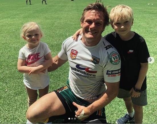 Nathan Ross with his children after he played at the Woy Woy Nines with Wyong.