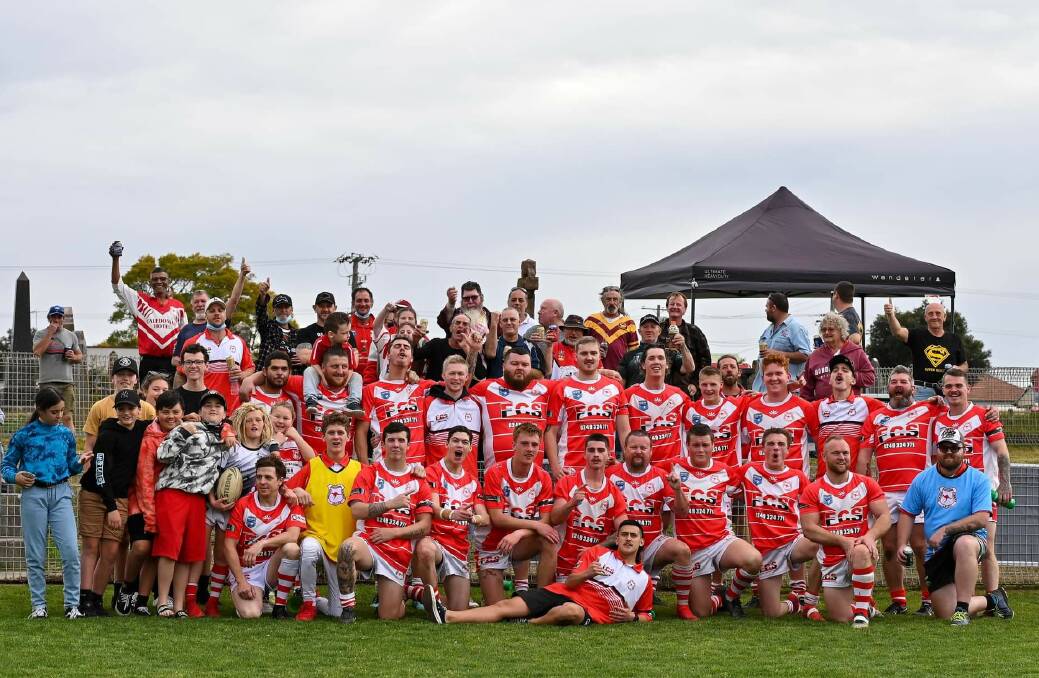 The Western Suburbs Red Dogs and the club's Old Boys after the team's 62-0 win against Waratah-Mayfield which has set them up for a top three finish.