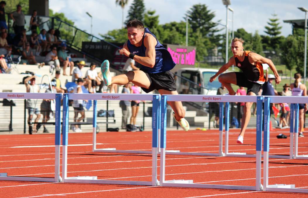 Mitchell Lightfoot on his way to winning the NSW Country Championship Men's Under-20 110 metres hurdle in record time. Picture: Athletics NSW