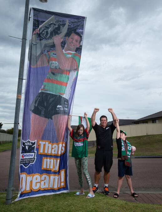 DEVOTED: There are no doubts about the allegiances in Sunday's NRL grand final of Tim Clarke and his children Megan and Alex. Picture: Marina Neil
