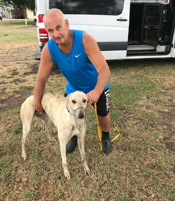 Londonderry trainer Alan Proctor with Clark Road. The pair won the $50 NSW GBOTA Member Dog draw and then backed up to win the Heddon Greta Hotel Stakes over 400m.