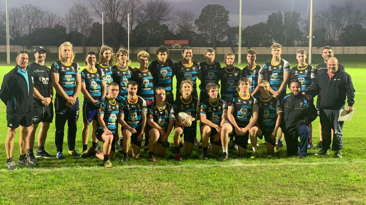 The St Mary's NRL Schoolboys Cup team is joined by Maitland Pickers and former students Matt Soper-Lawler and Jayden Butterfield. Picture: Supplied.