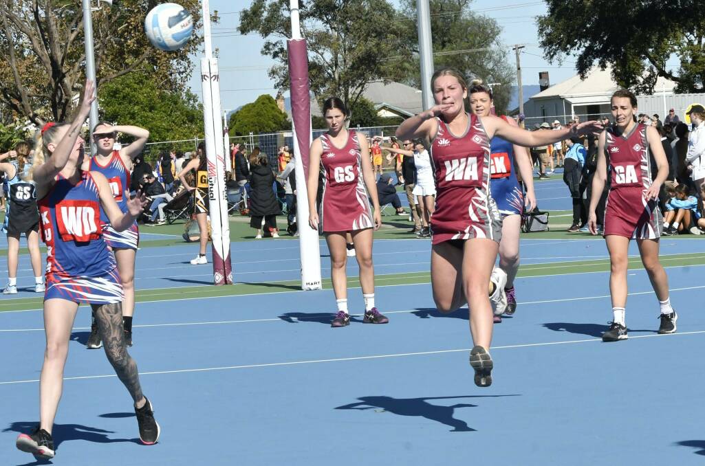 Jess Mossman leaps but is unsuccessful in trying to intercept a pass during a recent game between Maitland and Kurri Kurri opens teams. Picture: Amanda Hafey