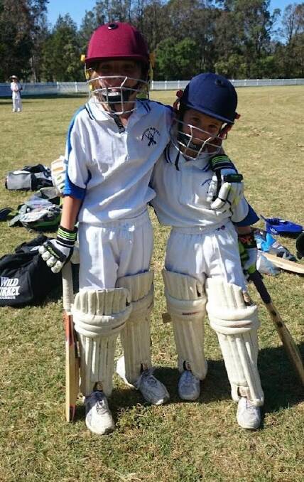 Naomi and Monique Krake getting ready to bat in their first game of under-11s in 2014. Picture supplied.