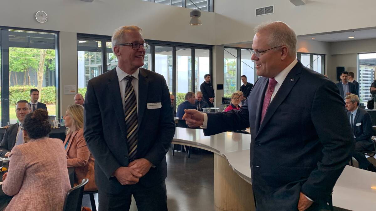 ENERGY PLAN: Prime Minister Scott Morrison (right) and Hunter Business Chamber CEO Bob Hawes at Tomago on Tuesday. Picture: Simone de Peak