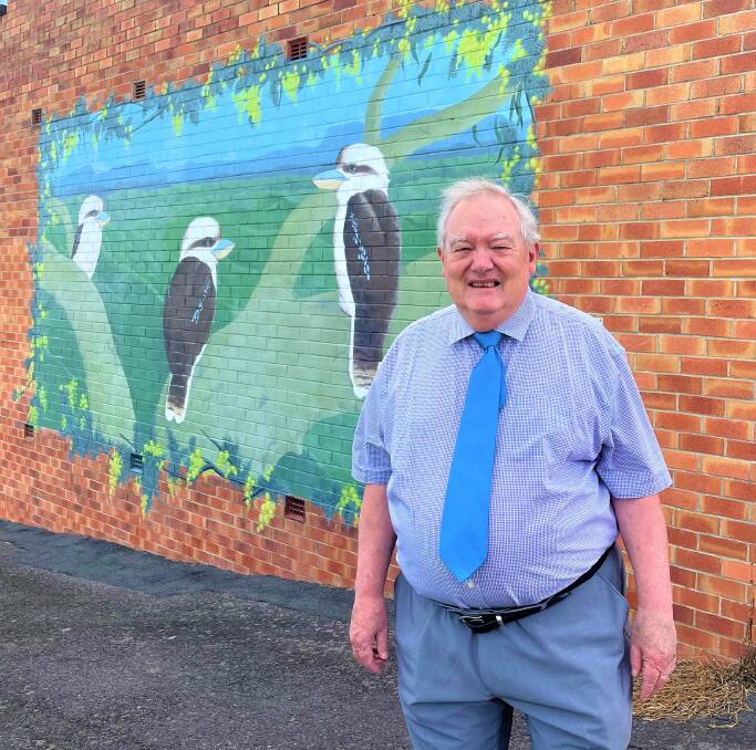 HISTORY BUFF: Mural tour guide with Towns With Heart is one of many volunteer roles Graham Smith holds in the Kurri Kurri community. Picture: Krystal Sellars