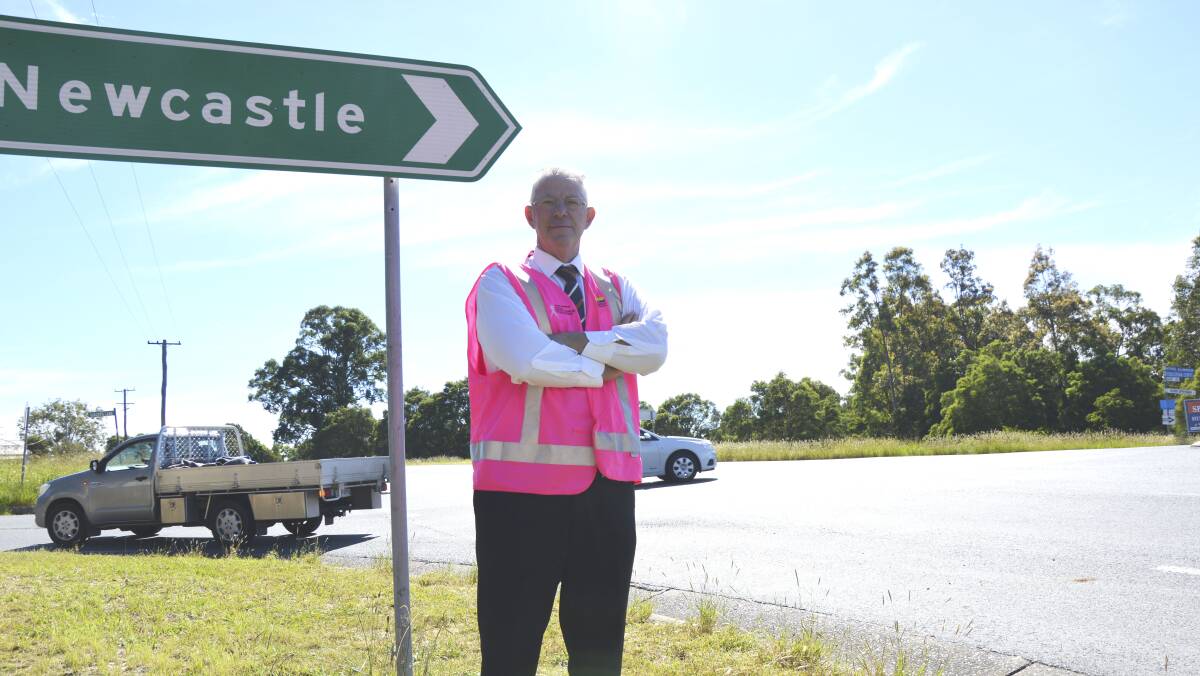 PRIORITY: Cessnock mayor Bob Pynsent at the intersection of Government Road and Hart Road, a vital link to the Hunter Expressway. Picture: supplied