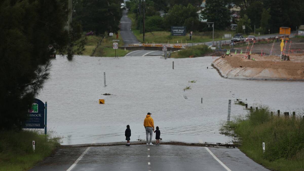 CUT OFF: Cessnock Road at Testers Hollow was flooded in March 2021. Picture: Simone De Peak
