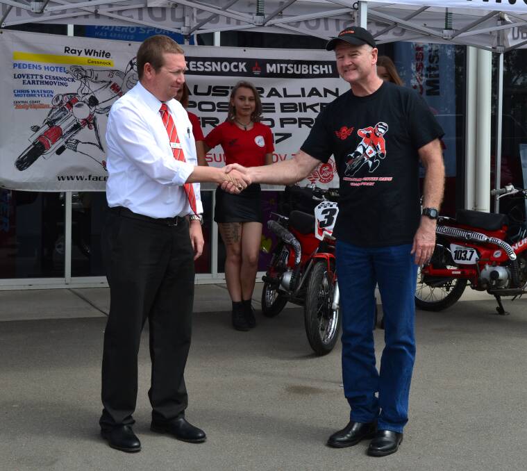Cessnock Mitsubishi general manager Scott Harris and event director Dave Robinson at the 2017 Australian Postie Bike Grand Prix launch on Tuesday. Picture: supplied