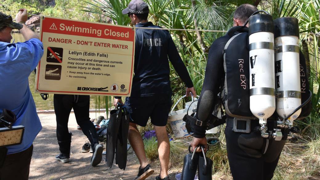 NT Police divers scoured local waterholes which are very popular with tourists escaping the Top End heat.