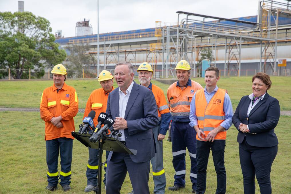 SMILES ALL AROUND: Federal Opposition leader Anthony Albanese with Paterson MP Meryl Swanson, Australian Workers Union national secretary Dan Walton, and hard-hatted employees of Tomago Aluminium.