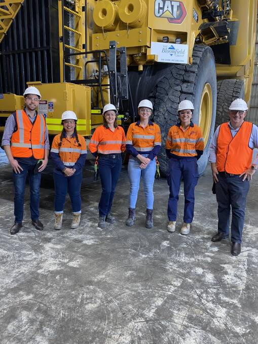 PITT WORKERS: Keith Pitt, federal Resources Minister, right, with National Party candidate James Thomson and employees at Bloomfield's Rixs Creek mine last month.