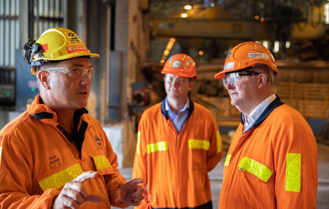 IT'S LIKE THIS: Tomago Aluminium CEO Matt Howell explains the smelter's power problems to federal Labor opposition leader Anthony Albanese, while Australian Workers Union national secretary, Dan Walton, looks on.