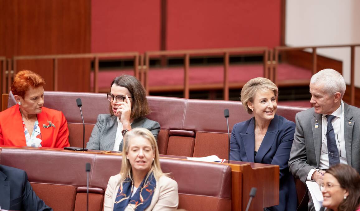 BEFORE LAST WEEK'S VOTE: Senators Pauline Hanson, Anne Ruston, Michaelia Cash, and Malcolm Roberts discuss the IR Bill on Thursday. Picture: Sitthixay Ditthavong