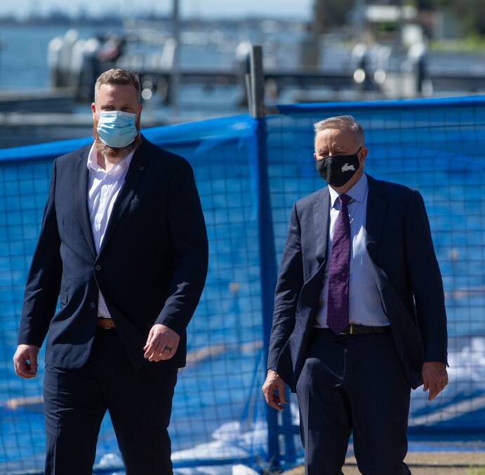 MASKED MEN: Dan Repacholi, Labor candidate for Hunter, with Labor leader Anthony Albanese in October last year. Picture: Marina Neil