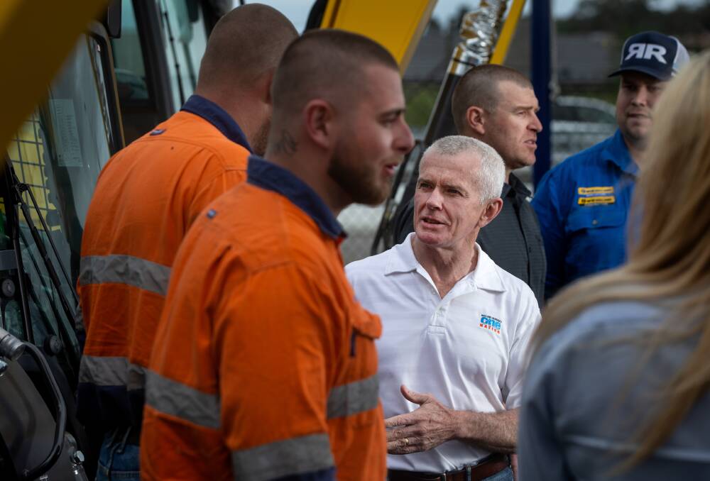 THE PARTY'S OVER: Stuart Bonds, in grey shirt, talks to Matt Jackson of Double R Equipment Repairs at Rutherford, while One Nation's Senator Malcolm Roberts talks to Double R workers. The photo was taken on January 20 last year. Two months later, on March 18, Senator Roberts voted with the government on a bill that backed employers on labour hire. Mr Bonds and One Nation parted ways in early April and he is now standing as an Independent in Hunter, having contested the seat in 2019. Picture: Marina Neil 