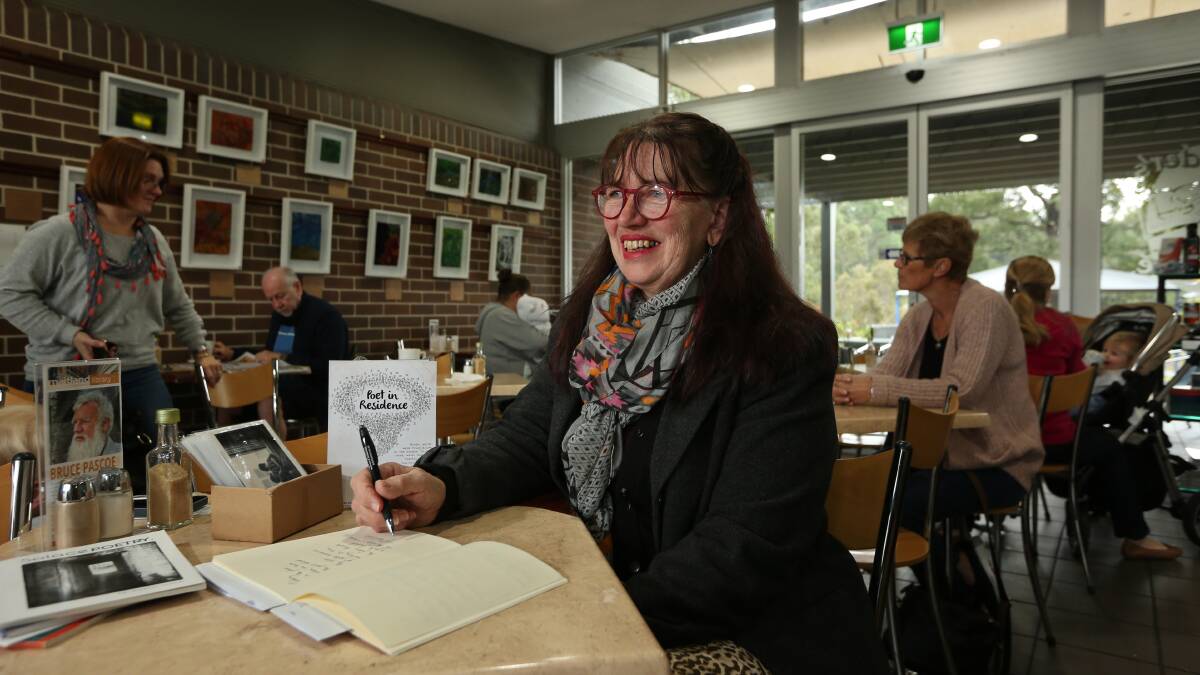 WRITING: Poet Pip Sheehan at Readers Cafe & Larder at East Maitland. Pip is one of the poets writing in public spaces around Maitland. Picture: Simone De Peak
