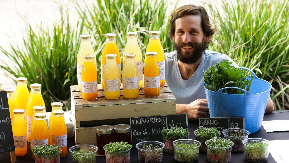 CORDIAL: Farmer Tom Christie of Four Acre Farm near Dungog with the cordial he transformed from citrus trees on his farm. 