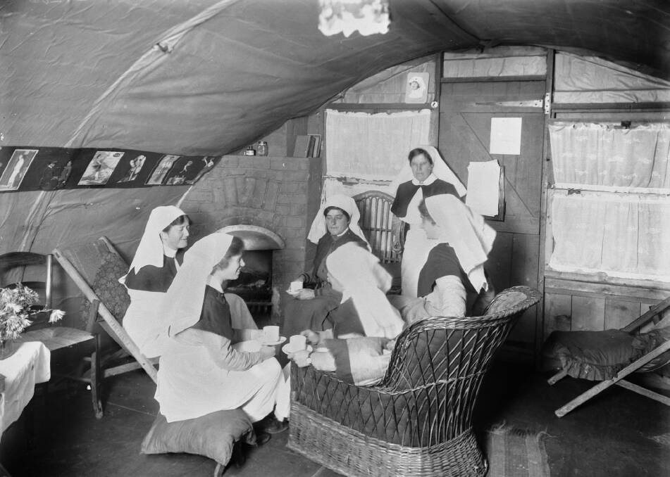 WAR: (left to right) Sister Mildred Crocker-Brown, Sister (Topsy) Tyson, Sister Homan (centre background), Sister Louisa Stobo (centre foreground), Sister Steward (standing), and Sister Shepherd in the nurses' mess.