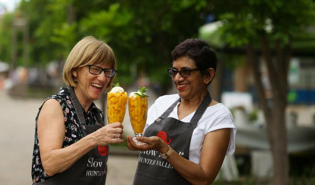 CHEERS: Slow Food Hunter Valley's Helen Hughes and Amorelle Dempster in 2017 after the first mango rescue in The Levee.