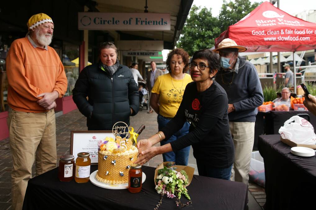 PARTY TIME: Slow Food Earth Market Maitland chairwoman Amorelle Dempster (front) with market beekeepers Eddie Williams, Crissy Rowcliff, Jennifer Sandstrom and Len Chesworth. Picture: Jonathan Carroll